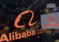 83054191 - alibaba.com logo on the glass against blurred business center. editorial 3d rendering