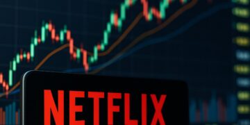 Logo de Netflix con gráficos financieros desenfocados al fondo simbolizando su alza de precio objetivo.