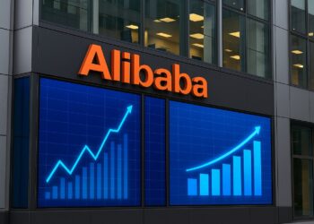 Fachada moderna de edificio de Alibaba con pantallas digitales que muestran gráficos financieros en alza