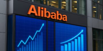 Fachada moderna de edificio de Alibaba con pantallas digitales que muestran gráficos financieros en alza
