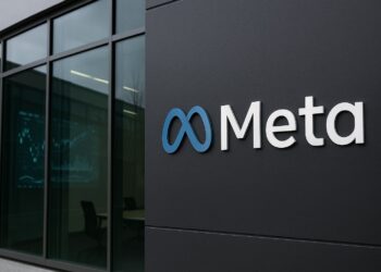 Fachada del edificio de Meta con reflejos tecnológicos que simbolizan ajustes en su área de IA.