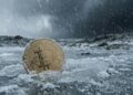 Bitcoin congelado en tormenta de nieve.