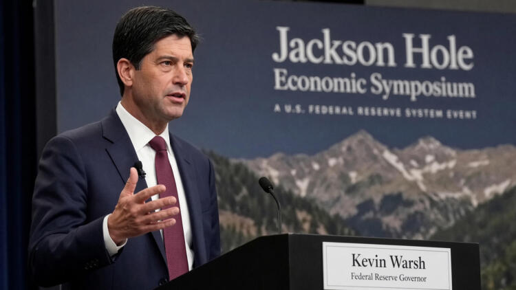 Kevin Warsh, gobernador de la Reserva Federal, habla en el simposio de Jackson Hole.